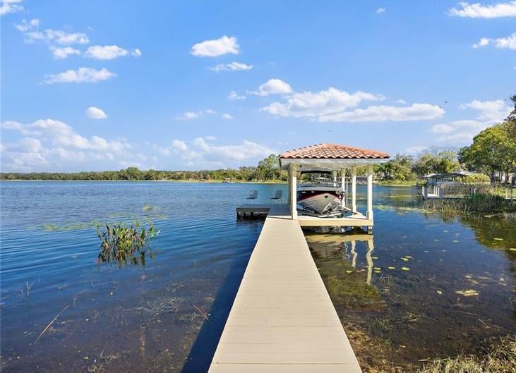 Lakefront Home For Sale In Mount Dora, Florida Featuring A Luxurious Pool, Design, & More